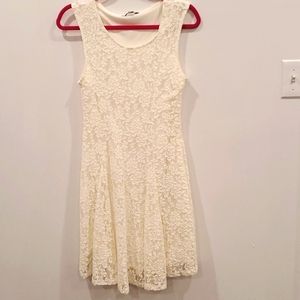 Cream/white lace dress.